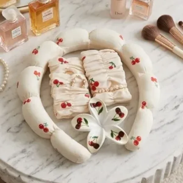 vincha acolchada de cereza y un set de accesorios 3 colores