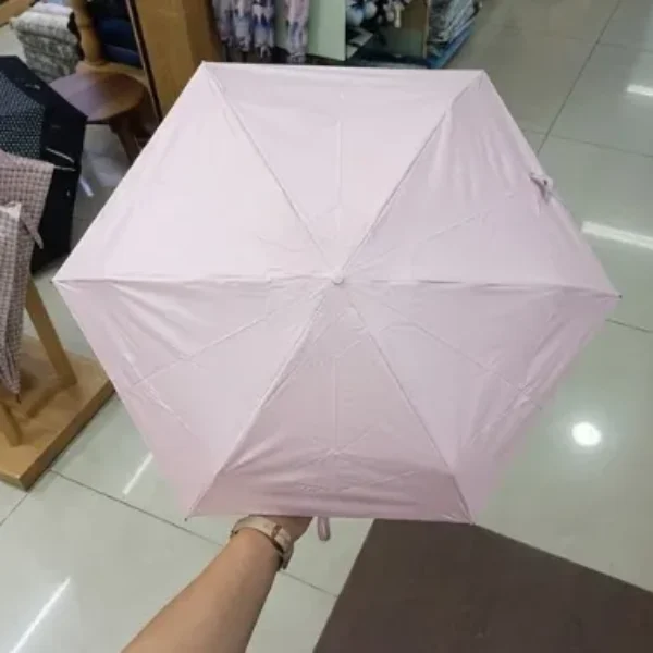 paraguas plegable en color rosa pastel 50CM